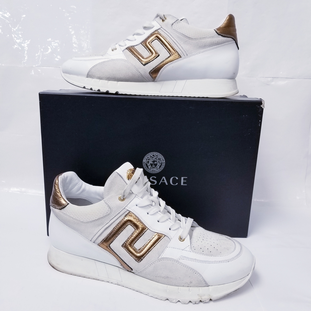 Versace Women's Sneakers in White and Gold